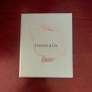 Tiffany & Co. Silver Love Script Bracelet by Paloma Picasso.